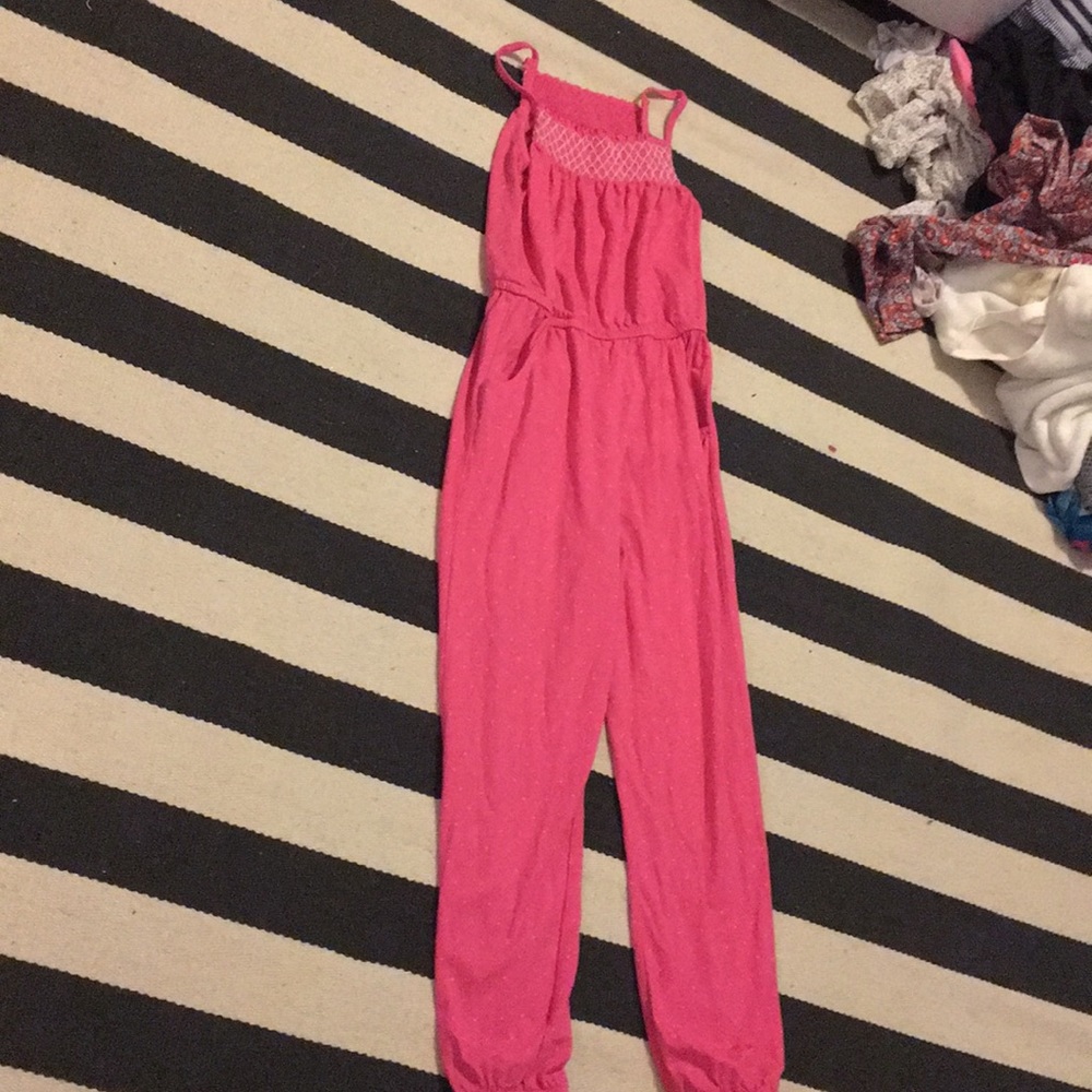 Pink jumpsuit with white polka dots